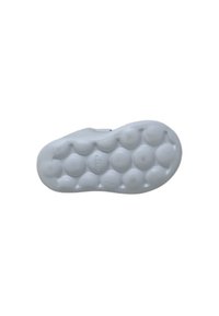 White rubber shoe sole with a rounded bubble pattern for grip, featuring smooth texture and a slight curve at the toe.