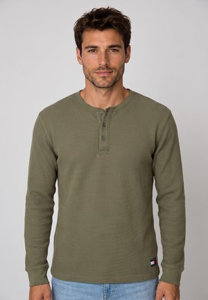 Tommy Jeans, DM0DM23549 . - Camiseta de manga larga - vert