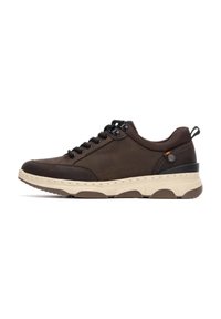 Zapatilla de cuero marrón con cordones y acentos negros, suela de goma y межsuela de color claro en contraste. Cuenta con una lengüeta en la parte trasera.