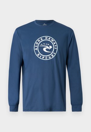 Granatowa koszula z długim rękawem z okrągłym białym logo przedstawiającym falę i Hawajskie Wyspy, na przodzie tekst "Aloha Hawaii Rip Curl".