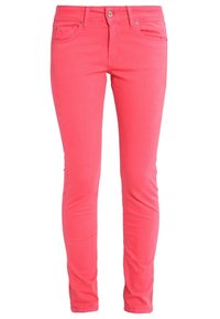 Różowe dżinsy o dopasowanym kroju, wykonane z bawełny o gładkiej fakturze, wyposażone w przednie kieszenie i zapięcie na zamek błyskawiczny.