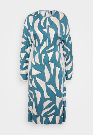 Teeled dress with an abstract cream pattern, long sleeves, round neckline, and a cinched waist. Made of lightweight fabric, smooth texture.