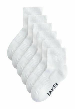 Six pairs of white ribbed crew socks stacked, with "BAKER" text on the foot of the front pair.
