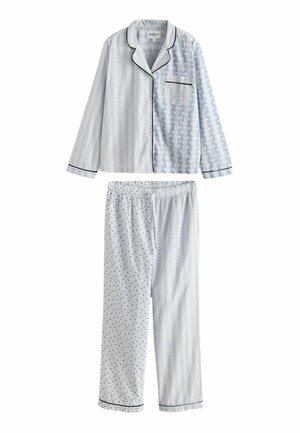 Set di pigiama in cotone composto da una camicia con bottoni caratterizzata da una combinazione di righe verticali e motivi floreali, abbinata a pantaloni con vita elastica.