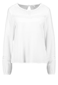 Blusa bianca a maniche lunghe realizzata in tessuto morbido, con bordo in pizzo sui polsini e un delicato design plissettato sul petto. Chiusura a chiave sul retro.