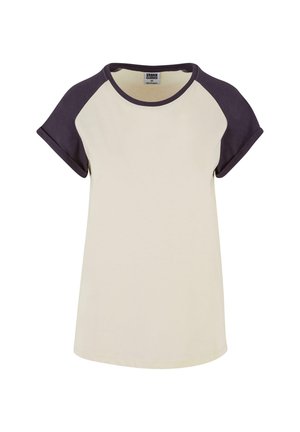 Cream-colored t-shirt with dark purple raglan sleeves, round neckline, and rolled sleeves, made from soft cotton fabric.