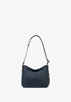 Navy leather shoulder bag with a textured surface, curved top, and an adjustable strap. Features a side pocket with contrasting stitching.