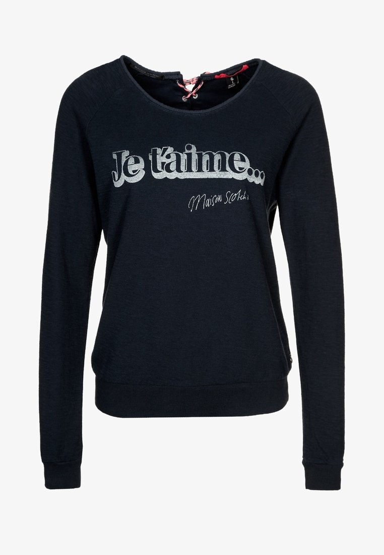 Sweat-shirt bleu marine à manches longues avec l'inscription "Je t'aime Maison Scotch" en blanc sur le devant et un détail lacé au niveau du col.