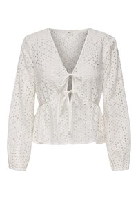 Top peplum bianco con maniche lunghe, caratterizzato da scollatura a V, fiocco frontale e tessuto ad occhiello con motivi ritagliati. Materiale testurizzato e leggero.