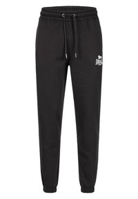 Black jogger pants made of cotton blend, featuring an elastic waistband with drawstring, cuffed ankles, and a small white logo on the side.