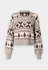 Pull court en V, beige et marron, présentant un motif géométrique et des poignets et un ourlet côtelés. Fabriqué à partir d'un tissu doux et texturé.