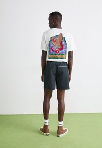 Converse RETRO CHUCK ELEVATED - Tréningruha alsók - black