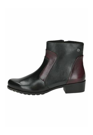 Bottines en cuir noires et bordeaux avec un bout rond, un petit talon et une texture lisse. Les accents latéraux présentent des formes contrastées.