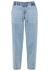 Světle modré denimové jogger kalhoty s elastickým pasem, stahovací šňůrkou, bočními kapsami a uvolněným střihem. Obsahují mírné vyblednutí a detaily švů.