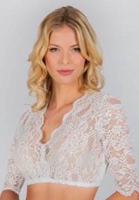 Weiße Spitzen-Bralette mit kurzen Ärmeln, die über einen gewellten V-Ausschnitt und filigrane Blumenmuster verfügt. Weicher, durchsichtiger Stoff.