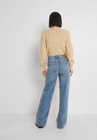 ONLY ONLJUICY WIDE LEG - Wide leg - medium blue denim
