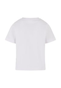 T-shirt blanc à manches courtes en coton. Il présente un col rond et une coupe droite avec des fentes latérales. Design uni, sans motifs ni graphiques.