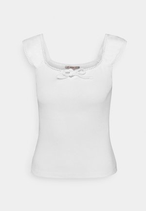 White cotton tank top with a square neckline, short sleeves, and a decorative bow at the front. Features delicate stitching along the edges.