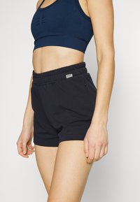 Smilodox DAMEN SHORTS - Calções desportivos - dunkelblau