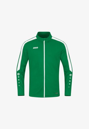 Grüne Sportjacke mit hohem Kragen, Reißverschluss vorne, weißen seitlichen Streifen und Knopfakzenten an den Ärmeln. Hergestellt aus einem glatten, synthetischen Material.