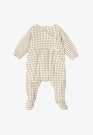 Mono de cuadros en beige con mangas largas, diseño cruzado, acento de lazo en la cintura y cierres a presión en la parte inferior y en la espalda. Tejido suave y texturizado.