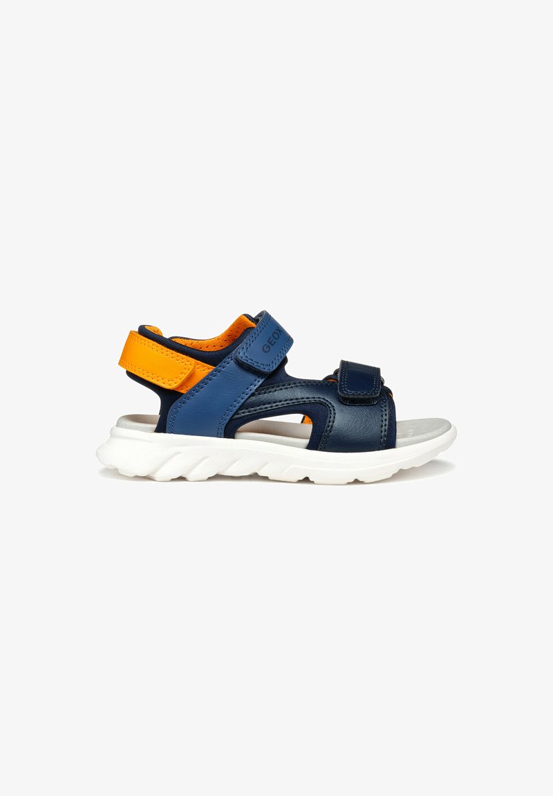 Sandales pour enfants bleues et orange avec une tige en cuir souple, des sangles velcro ajustables, un design ouvert et une semelle extérieure en caoutchouc blanc.
