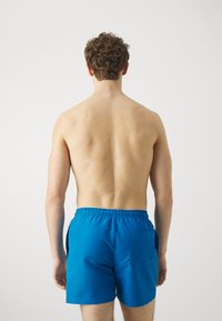 Calvin Klein Swimwear MEDIUM DRAWSTRING - Plavecké šortky - faience blue