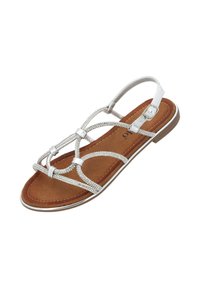 Srebrne sandały na płaskiej podeszwie, z regulowanymi paskami, wyposażone w wyłożoną brązowym zamszem wkładkę oraz dekoracyjne akcenty z cyrkonii na paskach.