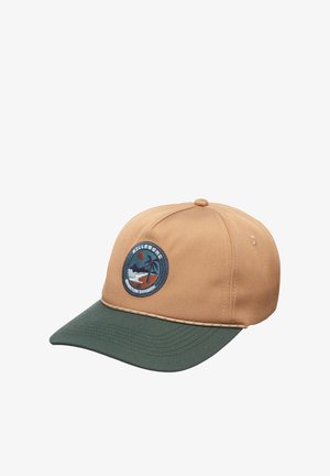 Beige pet met een groene klep, voorzien van een geborduurd rond embleem met een zon, golven en palmbomen. Gemaakt van stevig stof.