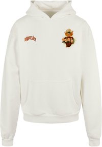 Hvid hættetrøje lavet af blødt stof, der har en frontlomme, ribbede manchetter og en broderet grafik af et hjerte med blomster og flammer.