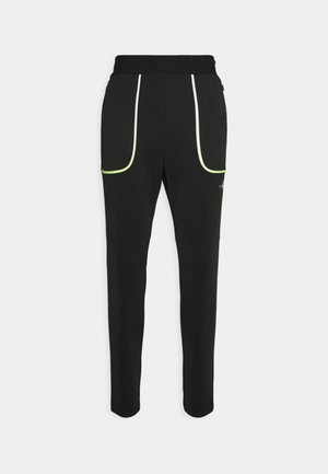 Zwarte sportbroek met een elastische tailleband, voorzien van witte en neon groene bies, twee frontzakken en een getailleerd ontwerp.