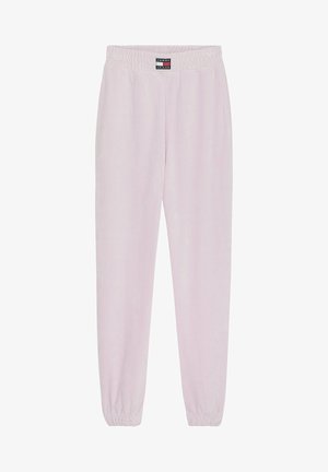 Pantaloni jogger rosa chiaro realizzati in tessuto morbido. Presentano un elastico in vita e polsini a coste alla caviglia. Logo Tommy Jeans in vita.