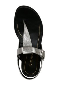Silver metallic thong sandal with a black sole, featuring a wide strap and adjustable buckle for a secure fit. Textured leather accents.