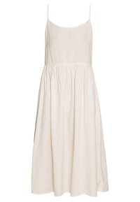 Jasnobeżowa sukienka z lnu z cienkimi ramiączkami, okrągłym dekoltem i marszczonym pasem. Lekka, sięgająca do kolan sylwetka o gładkiej teksturze.