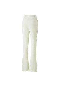 Lysgrønne, flagrende sweatpants med elastisk talje, blød tekstur og uden synlige mønstre eller accenter. Har to sidelommer.