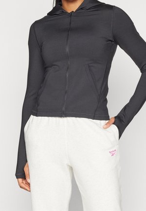 Tröja med dragkedja - black