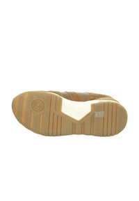Light brown athletic shoe sole with textured rubber for grip. Features white midsole and horizontal striped accents.
