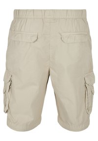 Beige cargo rövidnadrág, elasztikus derékkal, két oldalsó zseb és két hátsó zseb. Könnyű, texturált anyagból készült.