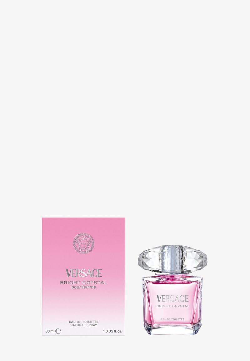 Versace Bright Crystal, 30 ml, présente un flacon en verre transparent avec un bouchon en forme de diamant, un liquide rose et un emballage dégradé rose avec un logo.