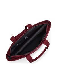 Burgundy patterned tote bag with a zip closure, fabric handles, and a black interior featuring multiple compartments for organization.