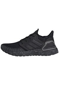 Scarpe da ginnastica nere con una tomaia in tessuto a maglia traspirante, suola testurizzata e logo a tre strisce. Design leggero con soletta ammortizzata.