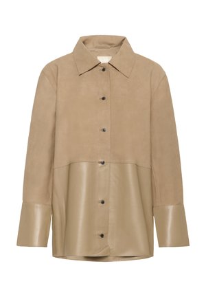 Beežist nahast ja seemisnahast särgjakk kraega kaeluse, seitsme musta nupu ja pikkade varrukatega; iseloomuliku kahvatu disainiga.