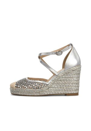 Silver wedge sandal with braided rope sole, ankle strap buckle, and open toe adorned with rhinestone embellishments.