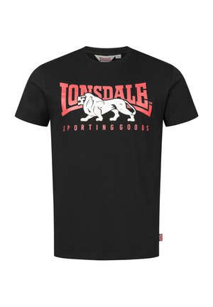 Black cotton t-shirt featuring a white lion graphic and red text reading "Lonsdale Sporting Goods." Classic round neck and short sleeves.