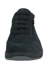 Black suede sneaker with lace-up front and side zipper, rounded toe, and rubber sole shown from front view.