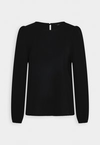 Maglietta nera a maniche lunghe con scollatura rotonda, realizzata in materiale testurizzato e con polsini elasticizzati. Presenta una piccola apertura a forma di chiave sulla schiena.