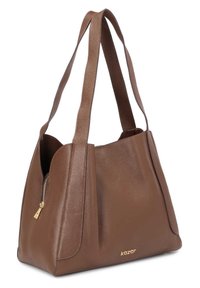 Brown leather tote bag with two shoulder straps, featuring a textured surface and a side zipper pocket. Gold branding accent on the base.