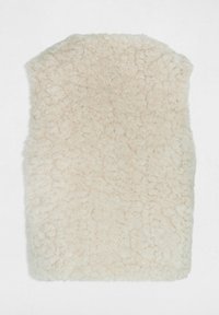 Plaid in pelliccia sintetica di colore crema con una superficie testurizzata e morbida, di forma rettangolare. I bordi sono leggermente arrotondati. Progettata per calore e comfort.