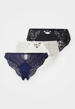 Tričko s čipkovými tangami v námořní modrej, čiernej a bielej farbe, s kvetinovými vzormi a prekračujúcim dizajnom vpredu.