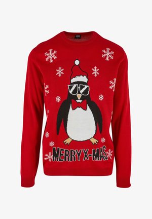 Piros kötött pulóver, amelyen napszemüveget viselő pingvin és Mikulás sapka látható, alul pedig fehér hópelyhek és a "KELLEMES ÜNNEPEKET" felirat található.